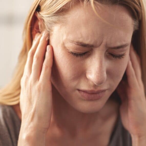 Woman with tinnitus.